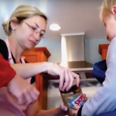 Toddler and preK family mixing with peanut butter